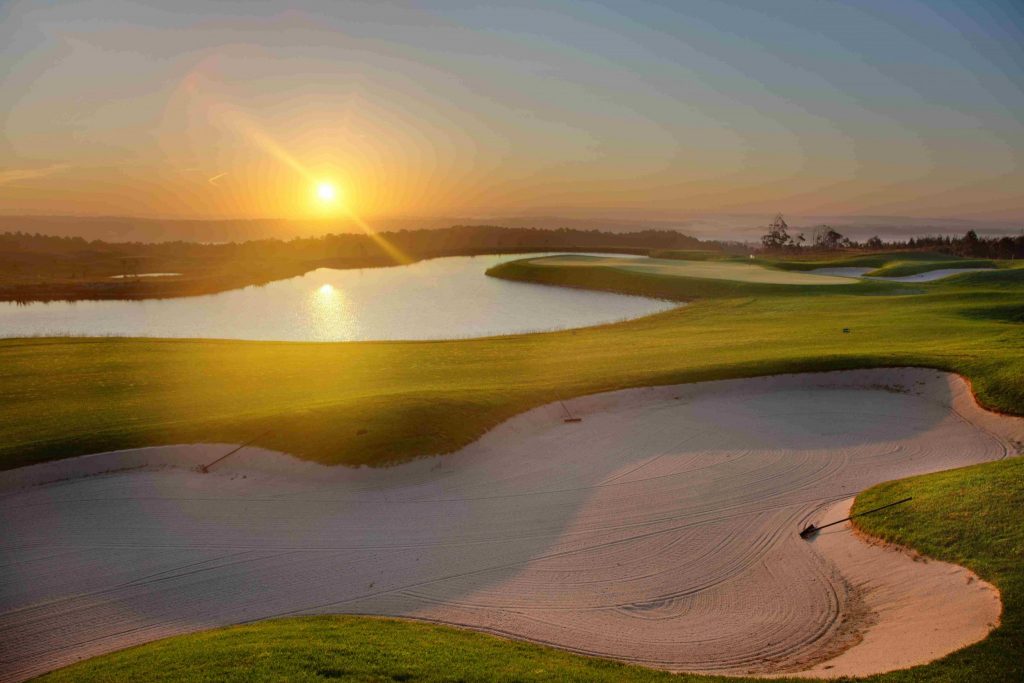 royal obidos golf course with a lake