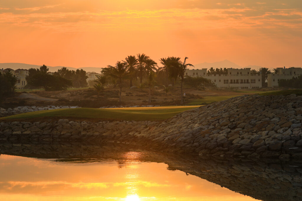 Lake with trees at sunset
