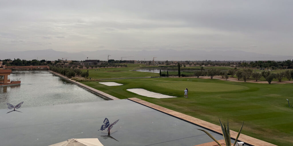 View overlooking Al Maaden Golf Course with a butterfly in the fountain
