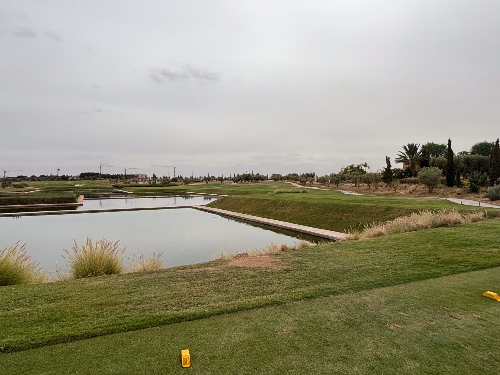 Tee box overlooking lake at Al Maaden Golf Course