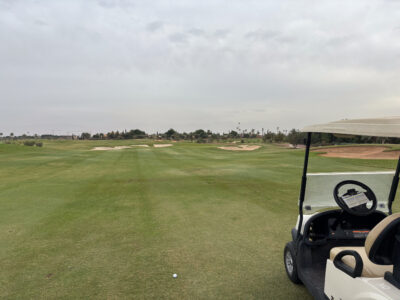 Fairway with buggy at Al Maaden Golf Course