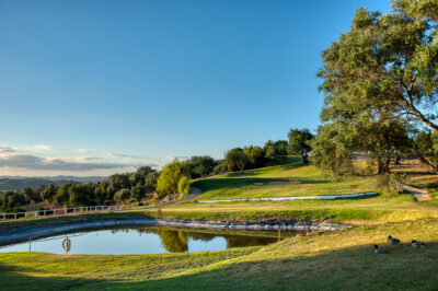 Water hazard with trees around on Benamor golf course