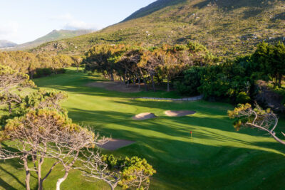 Hole with bunkers at Clovelly Country Club with trees around