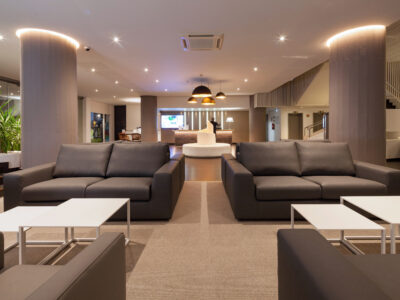 Dom Pedro Villamoura reception waiting area with sofa seats