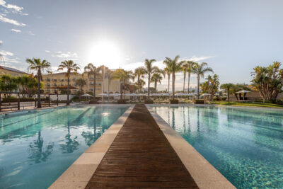 Path through the outdoor pools at Domes Lakes Algarve