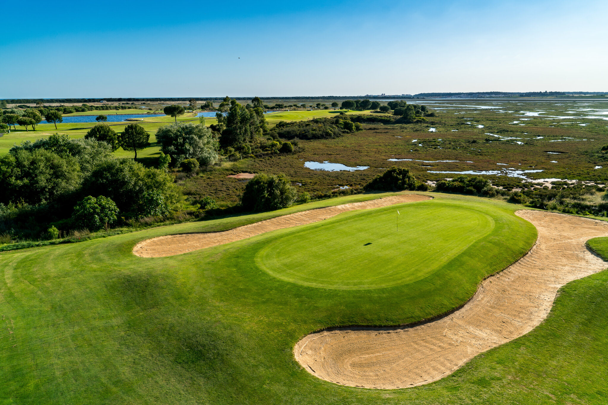 Hole with bunkers and trees