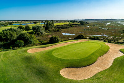 Hole with bunkers and trees