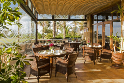 Elba Palace Golf Boutique Hotel outdoor but protected seating & dining area