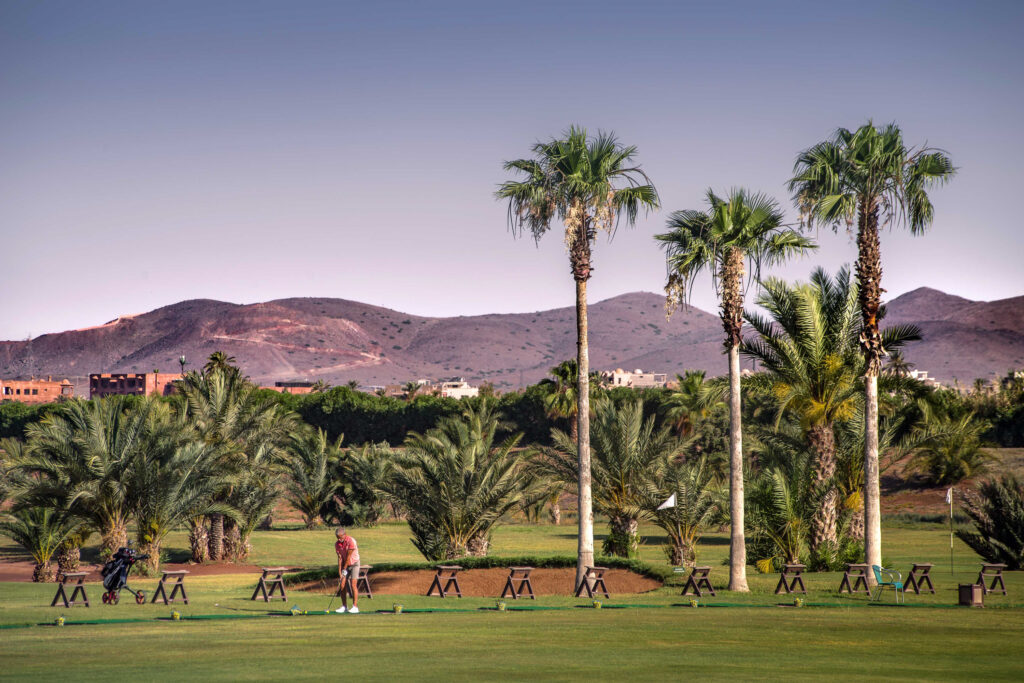 Drivign range with mountains in background at Golf Club Palmeraie