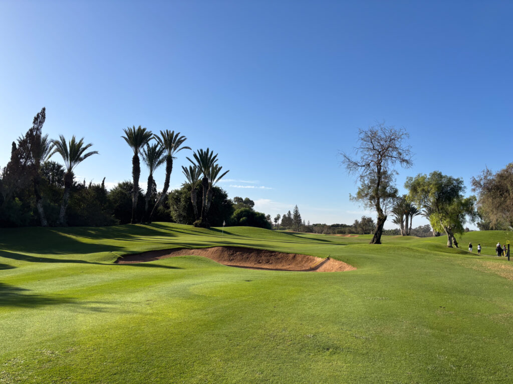 Fairway with bunker in front of green at Golf du Soleil