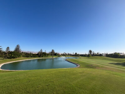 Fairway with lake running alongside at Golf du Soleil