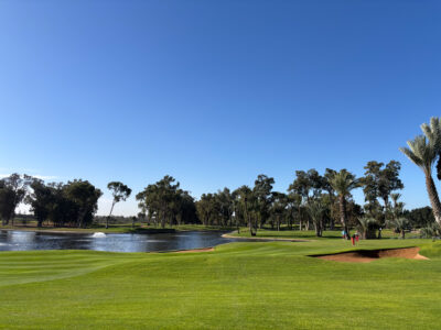 Fairway with bunker and lake in background at Golf du Soleil