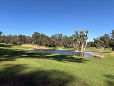 Fairway with lake at Golf Les Dunes Course