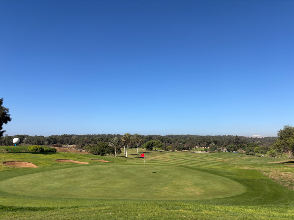 Greenside view with two bunkers on the left side of the green at Golf de L'Ocean Course