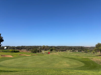 Greenside view with two bunkers on the left side of the green at Golf de L'Ocean Course