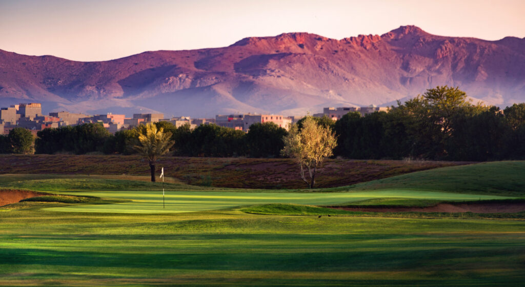 Fairway with mountains in distance at Hotel du Golf Rotana