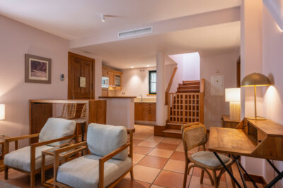 Hotel Villa Maria Suites lounge with staircase
