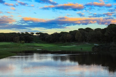 Lake on fairway with trees