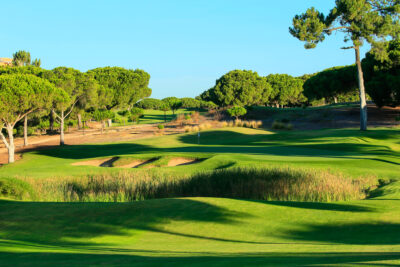 Fairway with bunkers and trees at Dom Pedro Pinhal