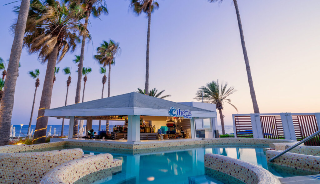 Outdoor poolside bar at Leonardo Plaza Cypria Maris
