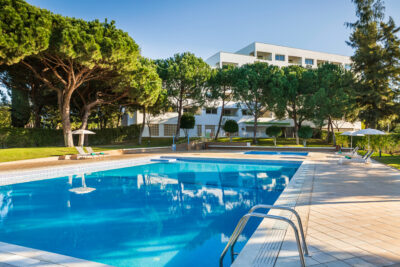 Outdoor pool at Patio Suite Hotel