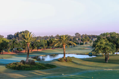 Lake on fairway with trees