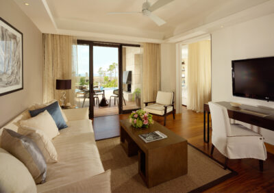 Accommodation living area with doors leading to a private patio