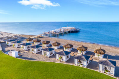Beach with day beds and loungers at Sirene Belek Hotel