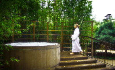 Person getting into jacuzzi at The K Club Hotel