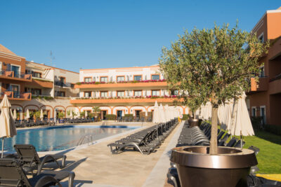 Sun loungers around the outdoor pool at Vila Gale Tavira