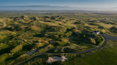 Aerial view of Carne Golf Links with mounds around