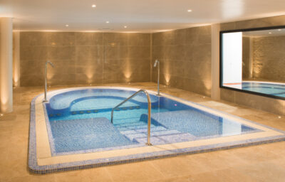 Indoor pool and jacuzzi at Chateau des Vigiers