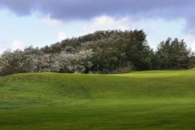 Hole with trees in background at Le Touquet - La Mer Course