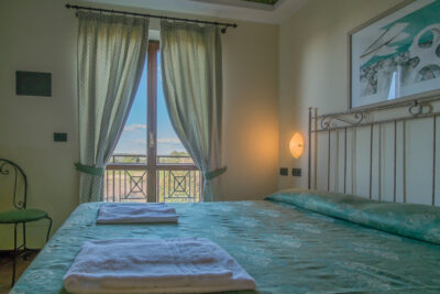 Carpediem Residence Relais - bedroom golf view
