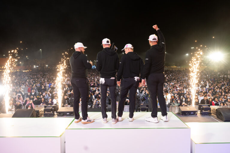 Legion XIII celebrating thier vicotry on the stage at LIV Golf Riyadh