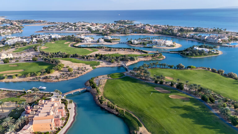 aerial view of golf courses in Egypt next to water ways