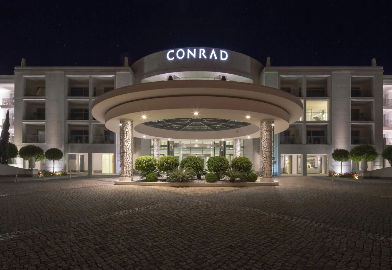 Conrad Algarve Main Entrance Night scaled
